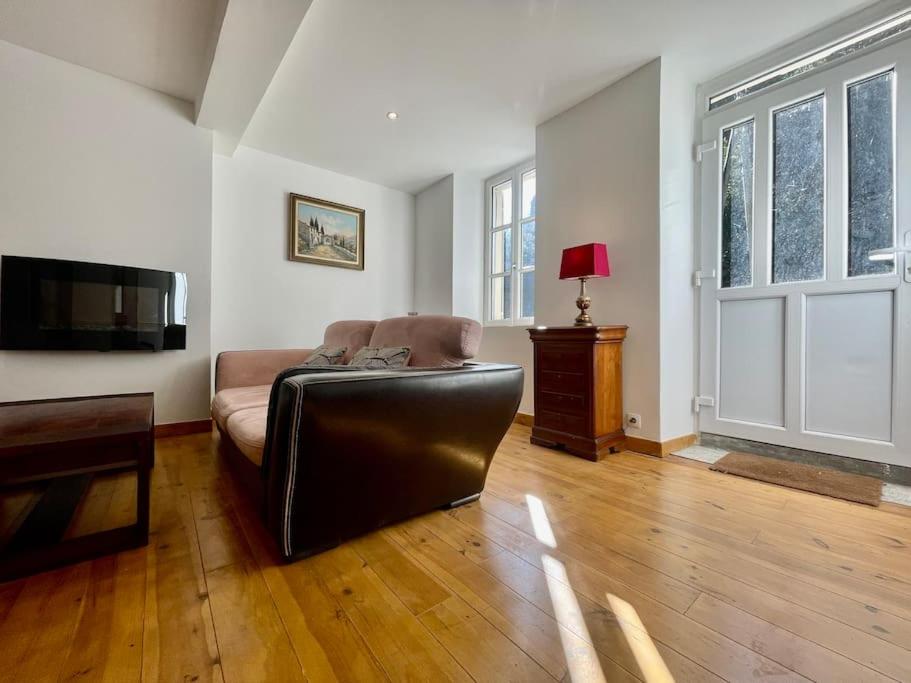 Telewizja i/lub zestaw kina domowego w obiekcie Jardin de la Garrigue - Maison 160m2 - Piscine