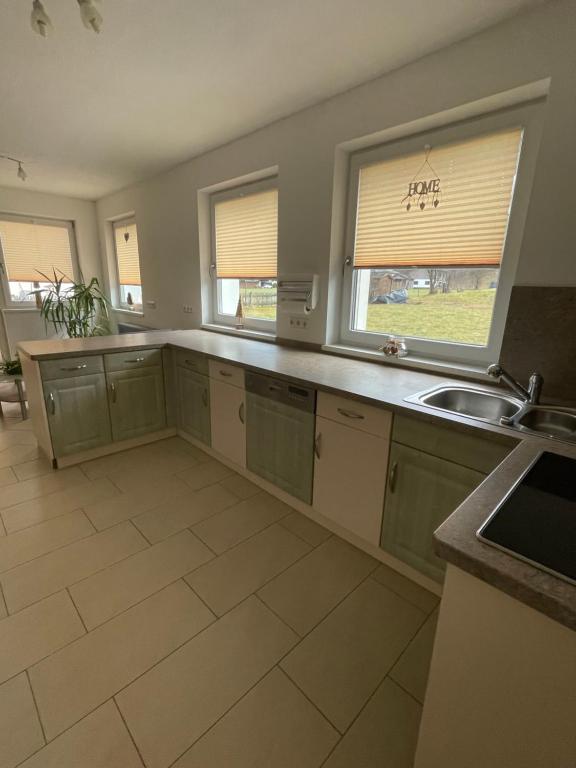 Kuchyň nebo kuchyňský kout v ubytování Karo`s Apartment
