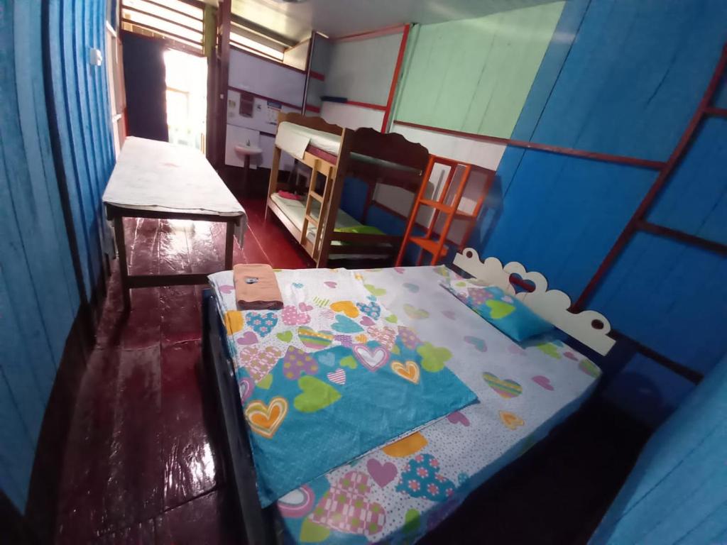Postel nebo postele na pokoji v ubytování Hostal tachiwa