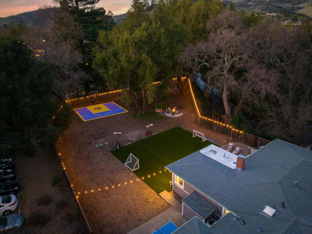 an overhead view of a backyard with a picnic table and a pool at Game On! in Novato