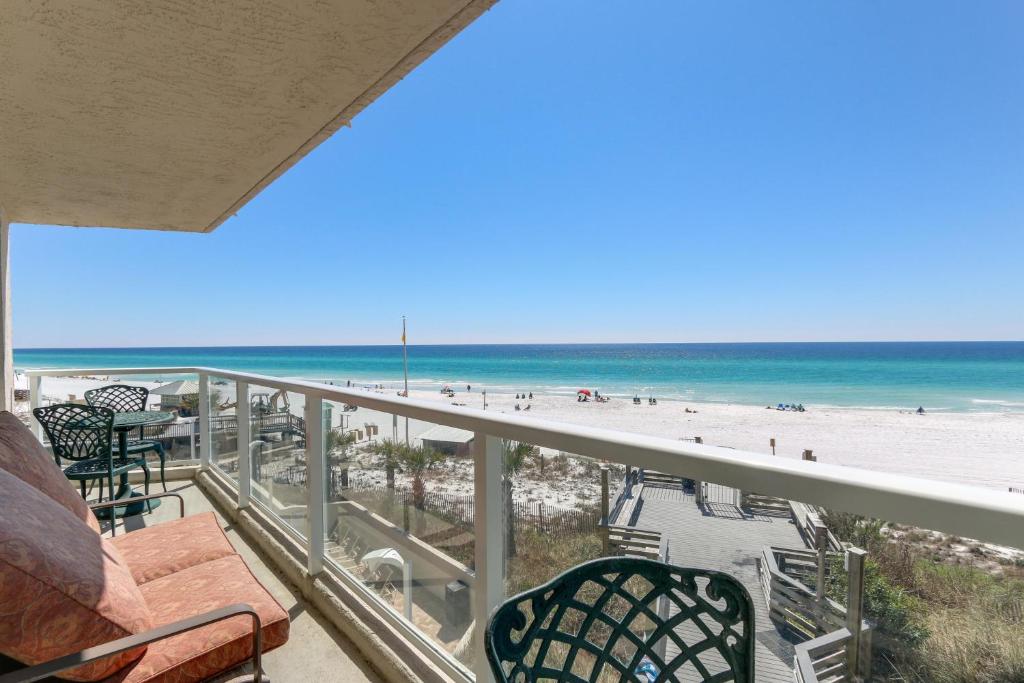 a balcony with a view of a beach and the ocean at Beachside II 4231 in Destin