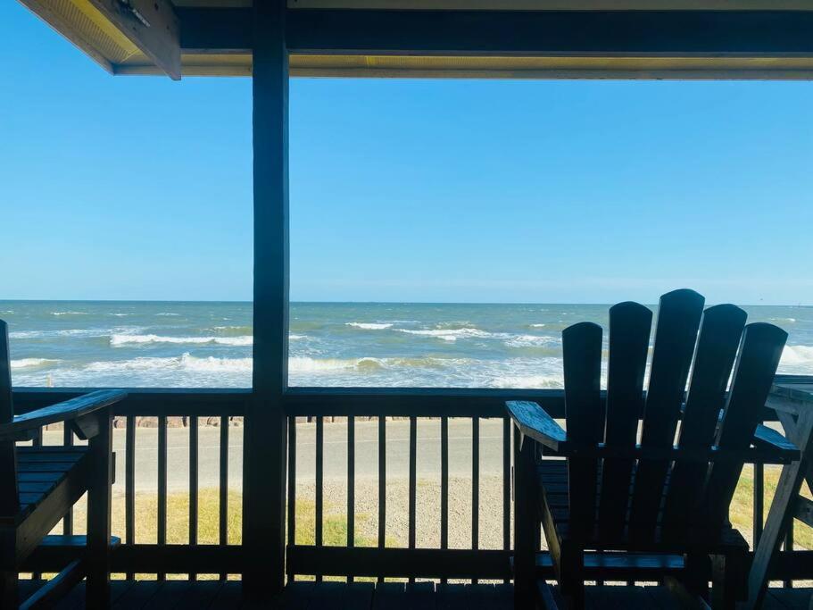 a view of the ocean from a porch with chairs at Beach House with Ocean view in Surfside Beach
