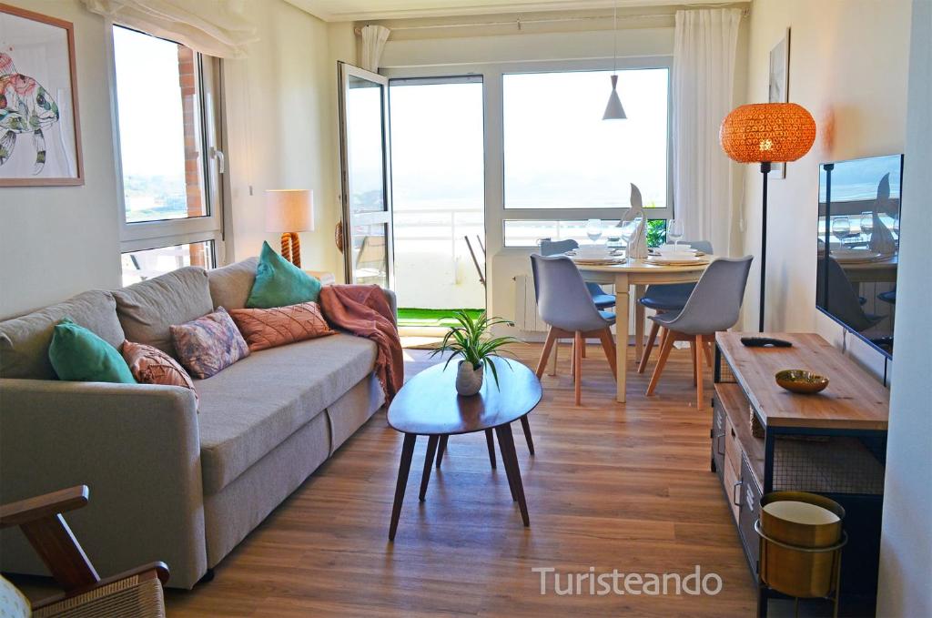Posezení v ubytování Dúplex ANANDA, vistas impresionantes con parking y piscina comunitaria