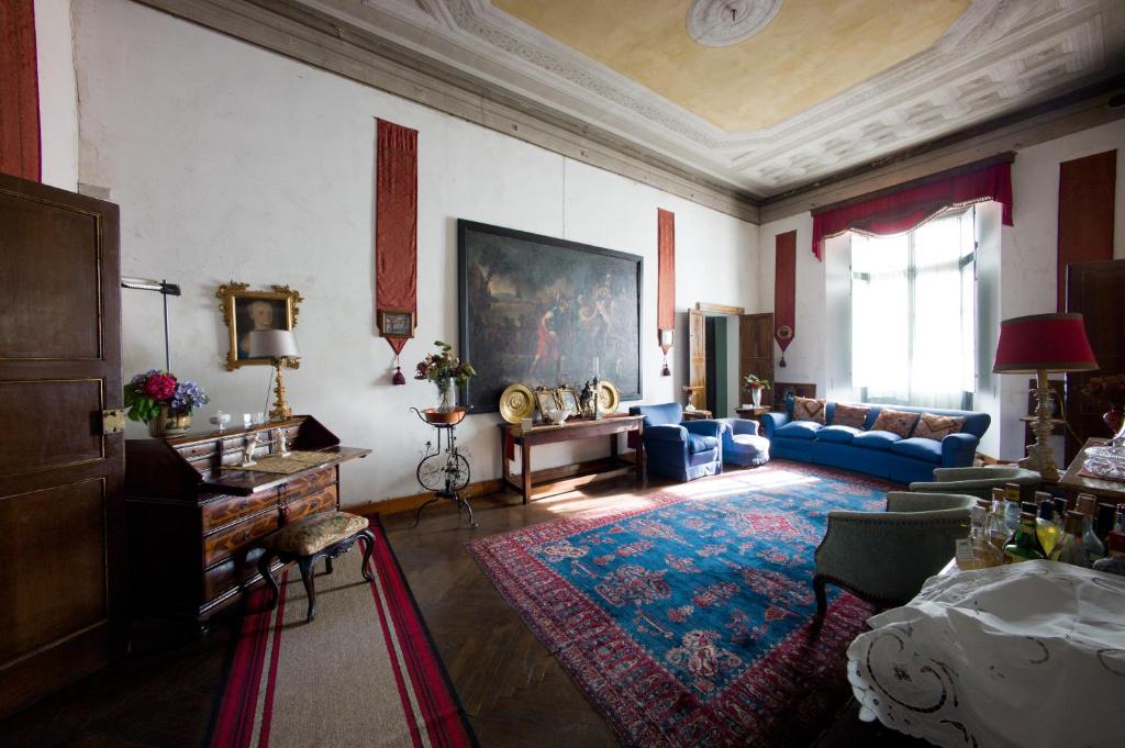 Postel nebo postele na pokoji v ubytování Palazzo Castiglioni luxury suite and rooms