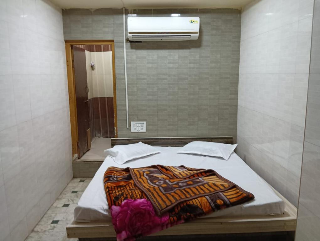 Krevet ili kreveti u jedinici u okviru objekta Hotel Kohinoor Palace