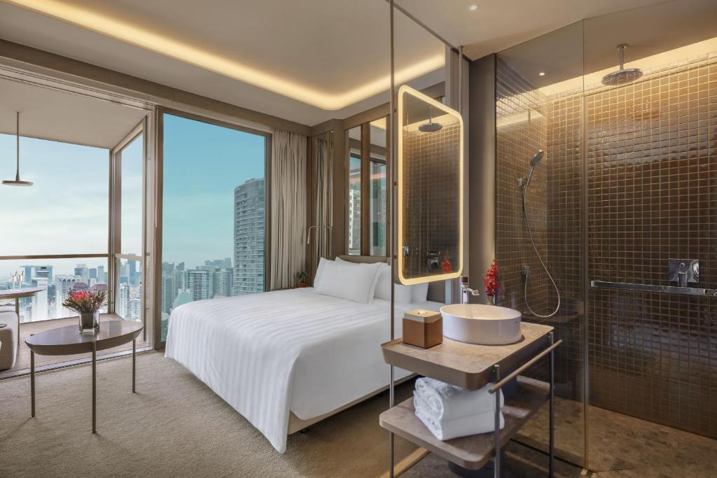 Giường trong phòng chung tại Pan Pacific Orchard