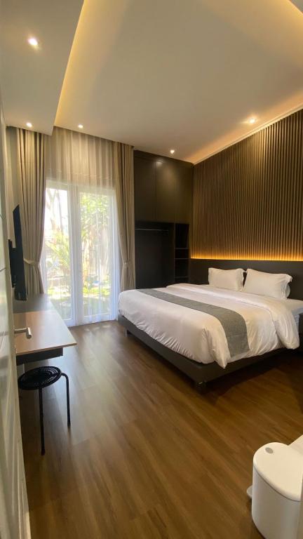 Postelja oz. postelje v sobi nastanitve Villa Ravani Bandung