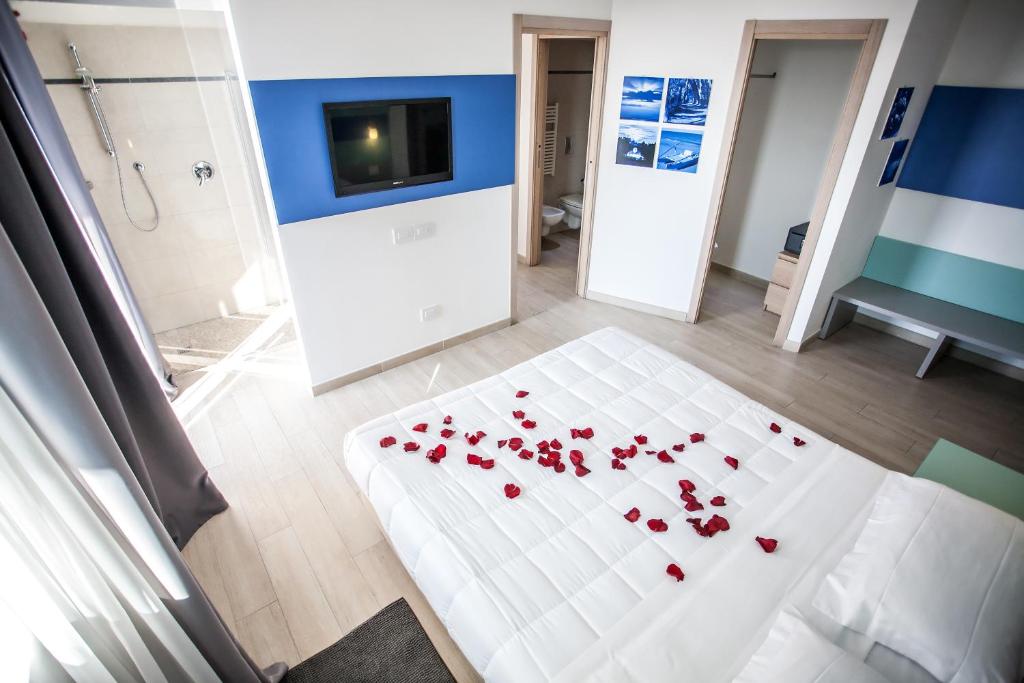 Postel nebo postele na pokoji v ubytování Hotel Oceanomare