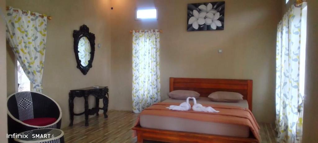 Postel nebo postele na pokoji v ubytování G-Rima Home Stay