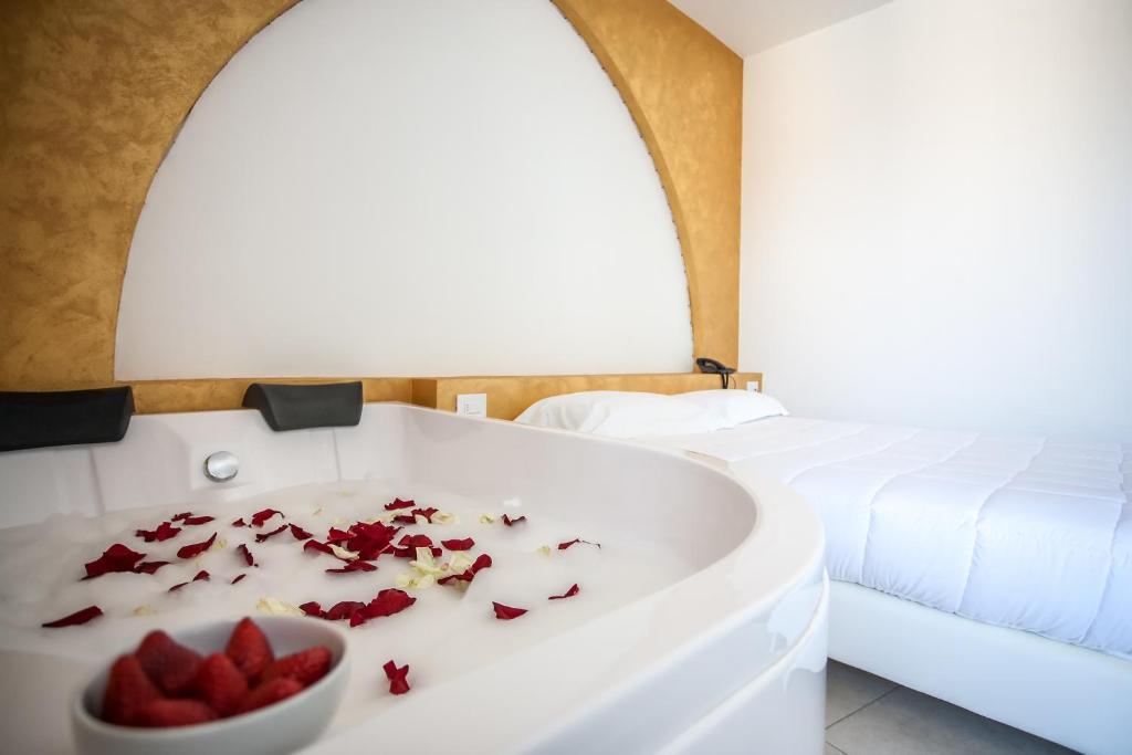 Postel nebo postele na pokoji v ubytování Hotel Oceanomare