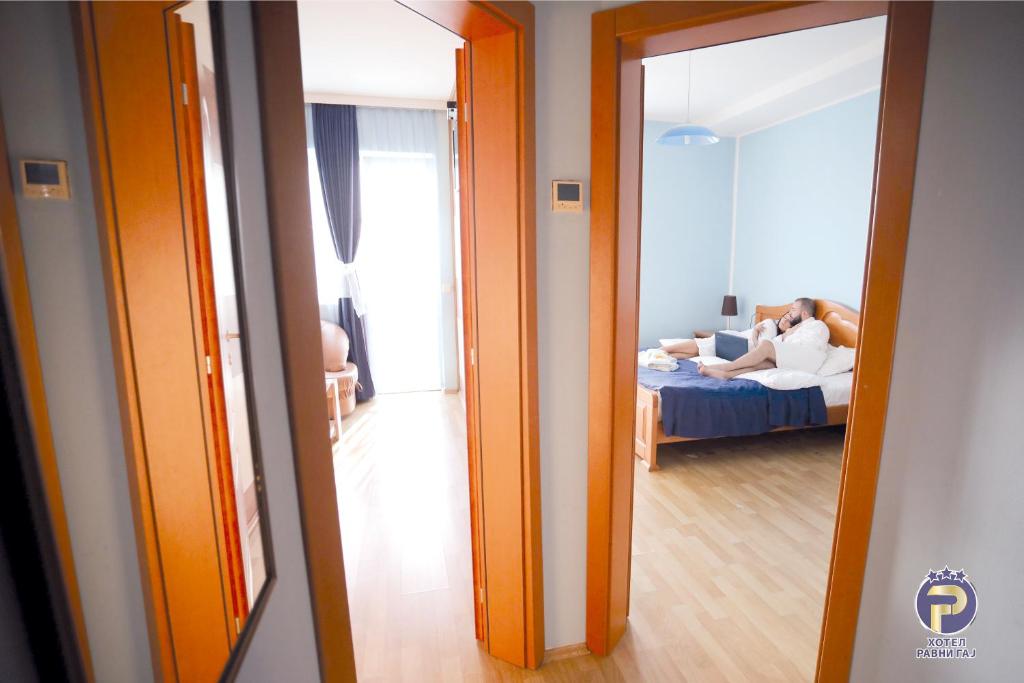 Postel nebo postele na pokoji v ubytování Hotel Ravni Gaj