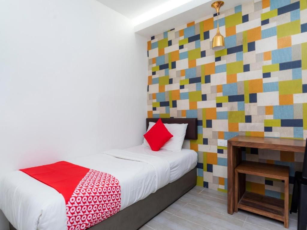 Postel nebo postele na pokoji v ubytování Big Big Hotel