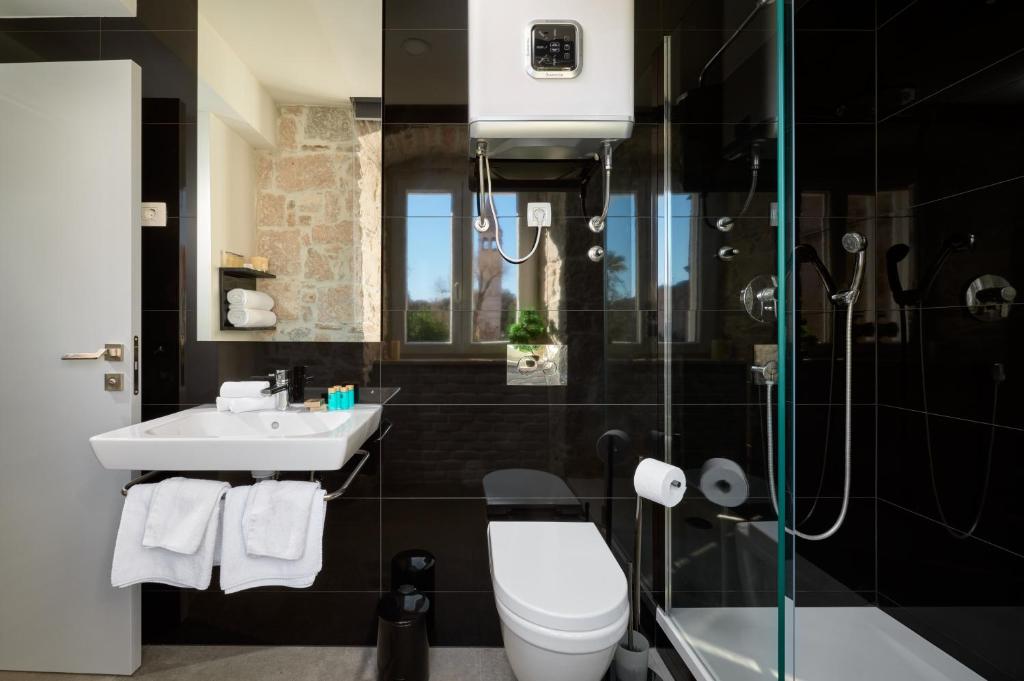 Koupelna v ubytování Bernardi Rooms