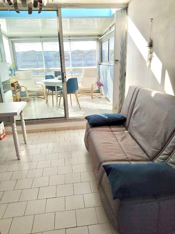 Posezení v ubytování Appartement grande terrasse Climatisé