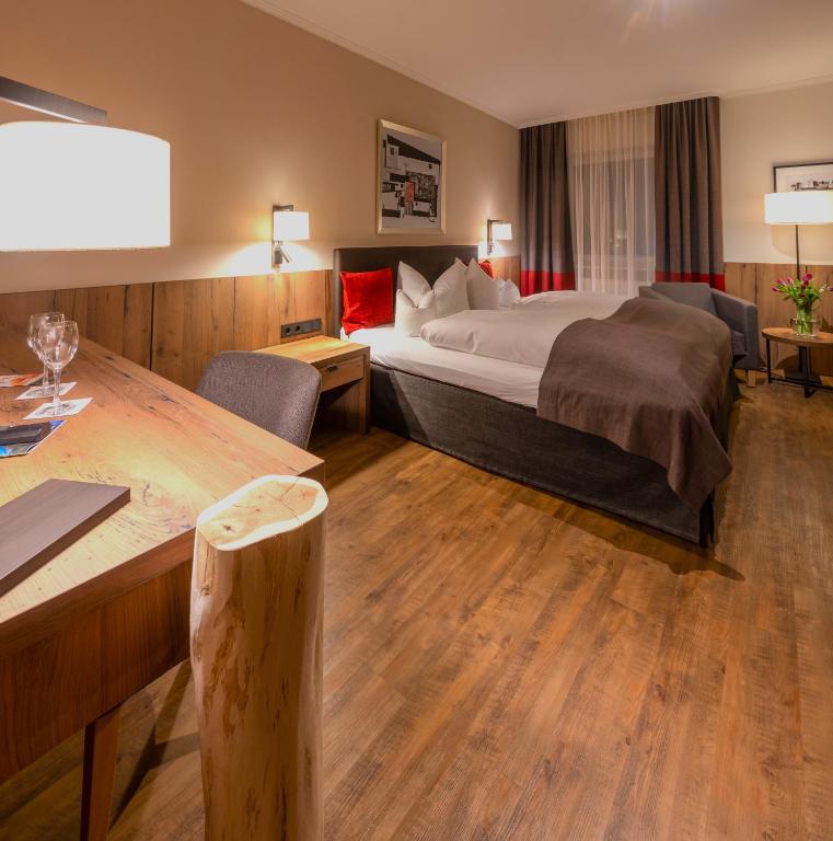Postel nebo postele na pokoji v ubytování Hotel Bavaria