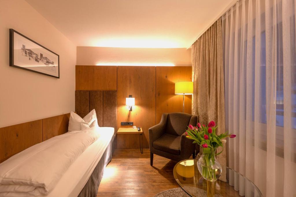 Postel nebo postele na pokoji v ubytování Hotel Bavaria