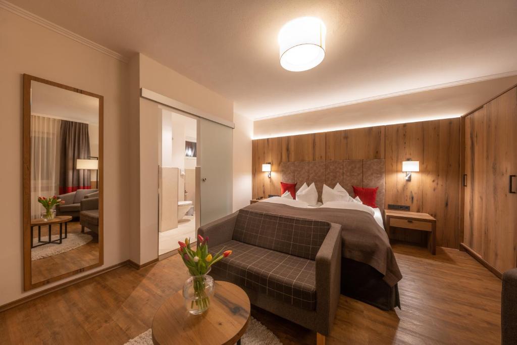 Postel nebo postele na pokoji v ubytování Hotel Bavaria