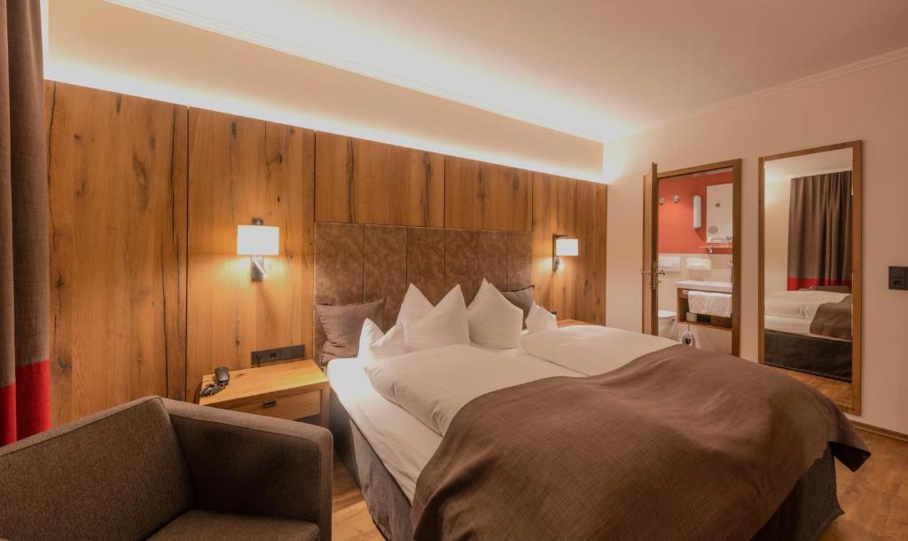Postel nebo postele na pokoji v ubytování Hotel Bavaria