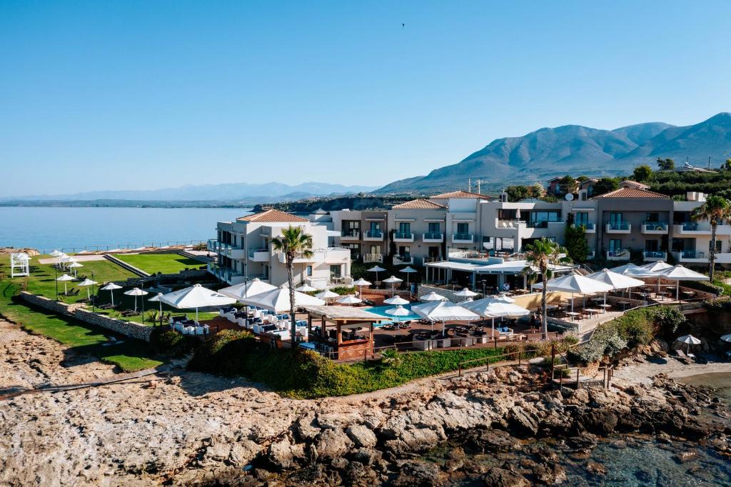 an aerial view of a resort on the beach at Alas Resort & Spa in Elia Laconias