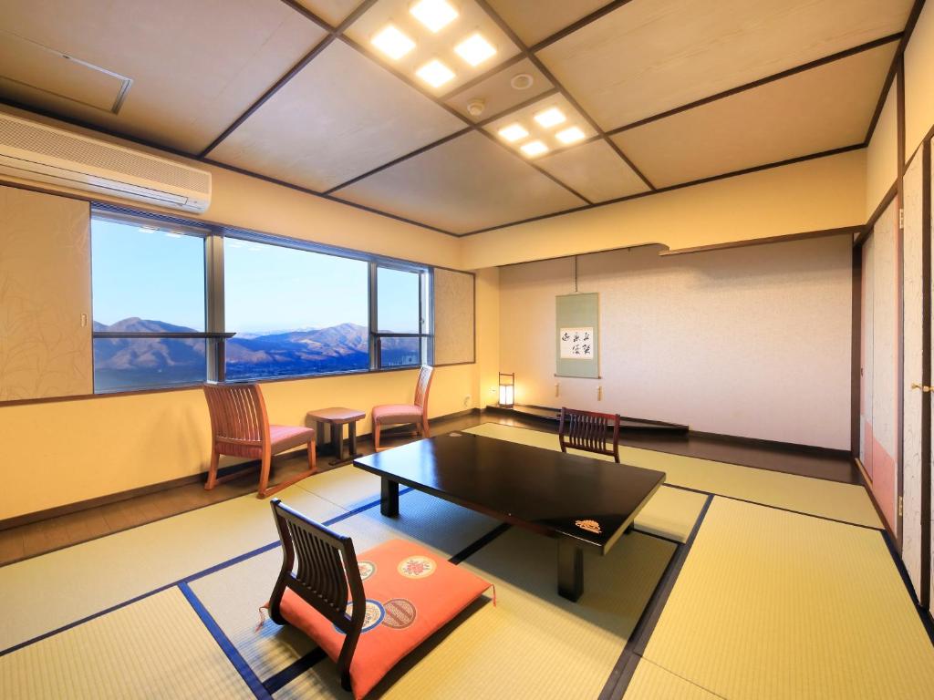 Posezení v ubytování Kishigon Ryokan