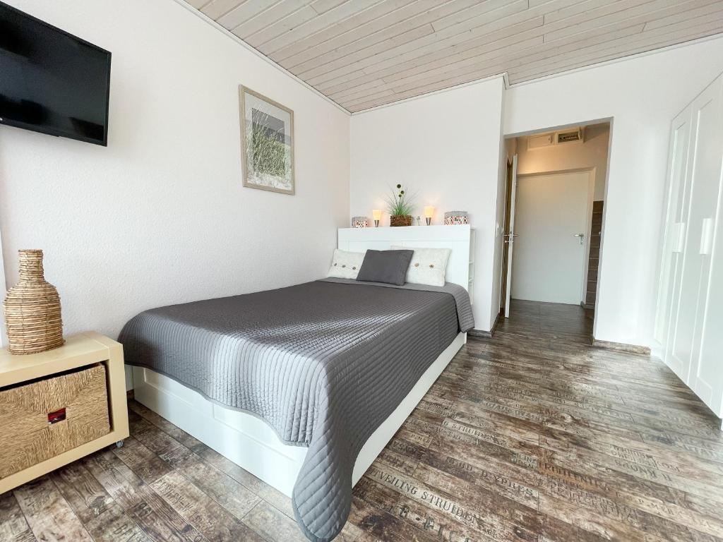 Postel nebo postele na pokoji v ubytování Frische Brise Frische Brise 06 05