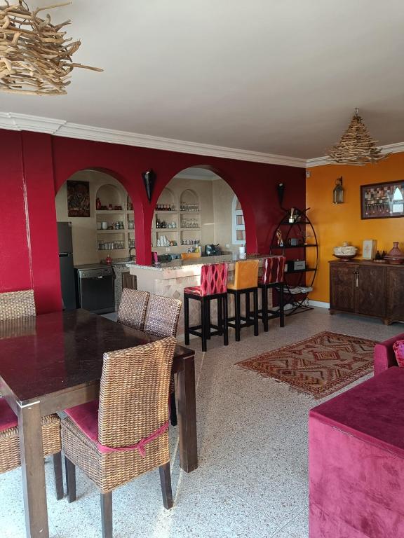 Ruang duduk di Villa sur la plage