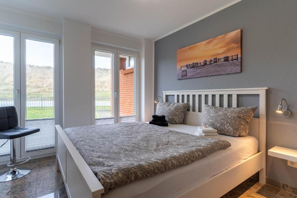 Postel nebo postele na pokoji v ubytování Haus-Eriel-EG-rechts