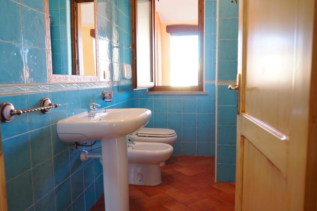 A bathroom at Mereu Central Apartment