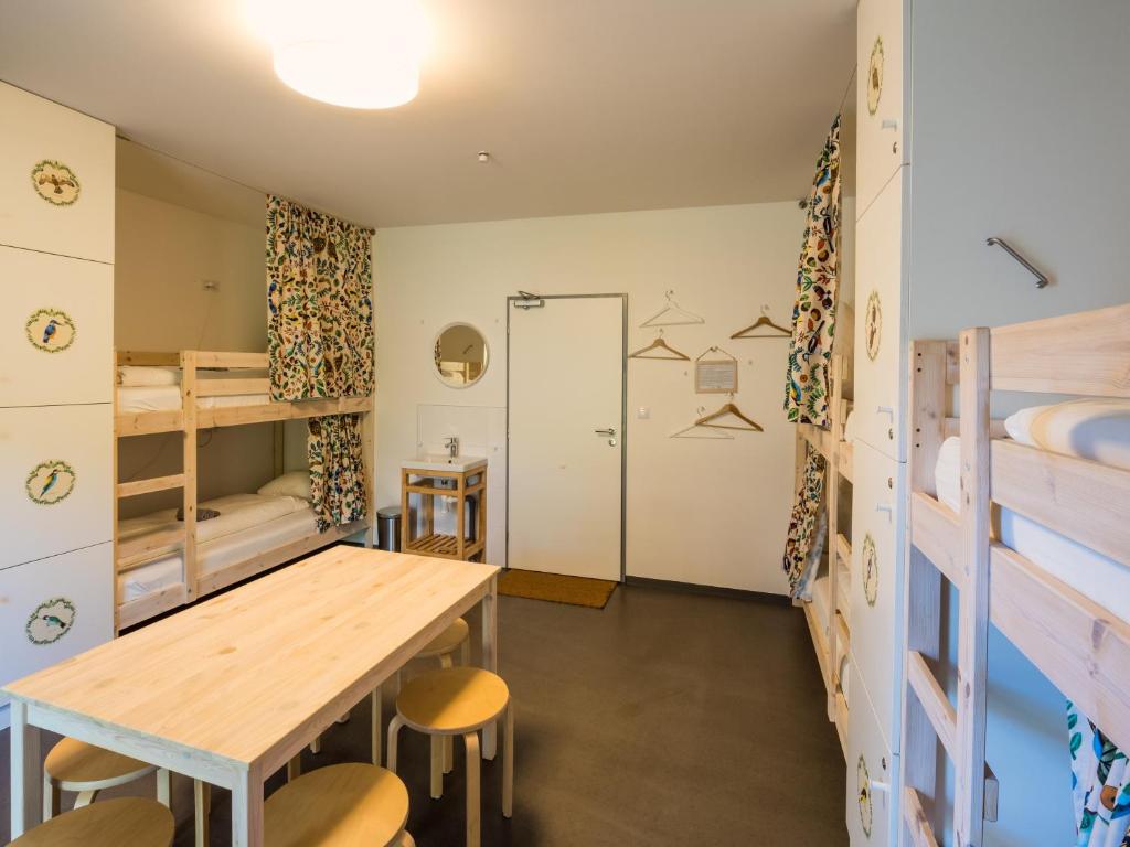 Ένα ή περισσότερα κρεβάτια σε δωμάτιο στο Hostel Zahrada Mikulov