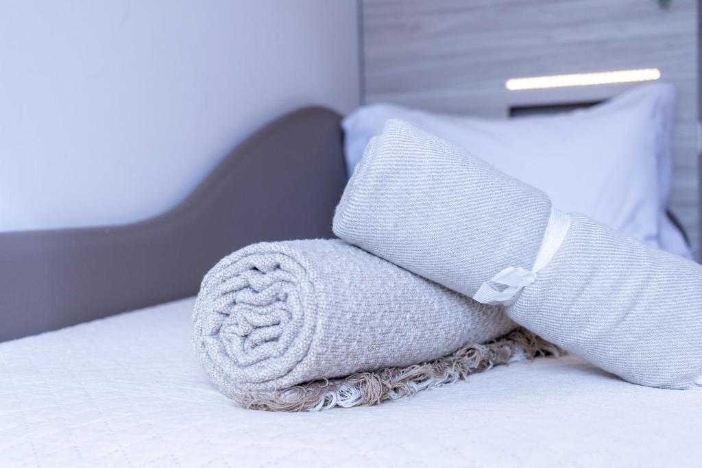 Postel nebo postele na pokoji v ubytování Hotel Alfonsina