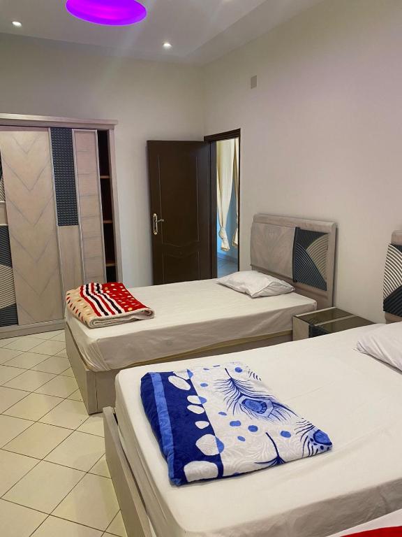 Postel nebo postele na pokoji v ubytování Golden Plaza Dahab Resort