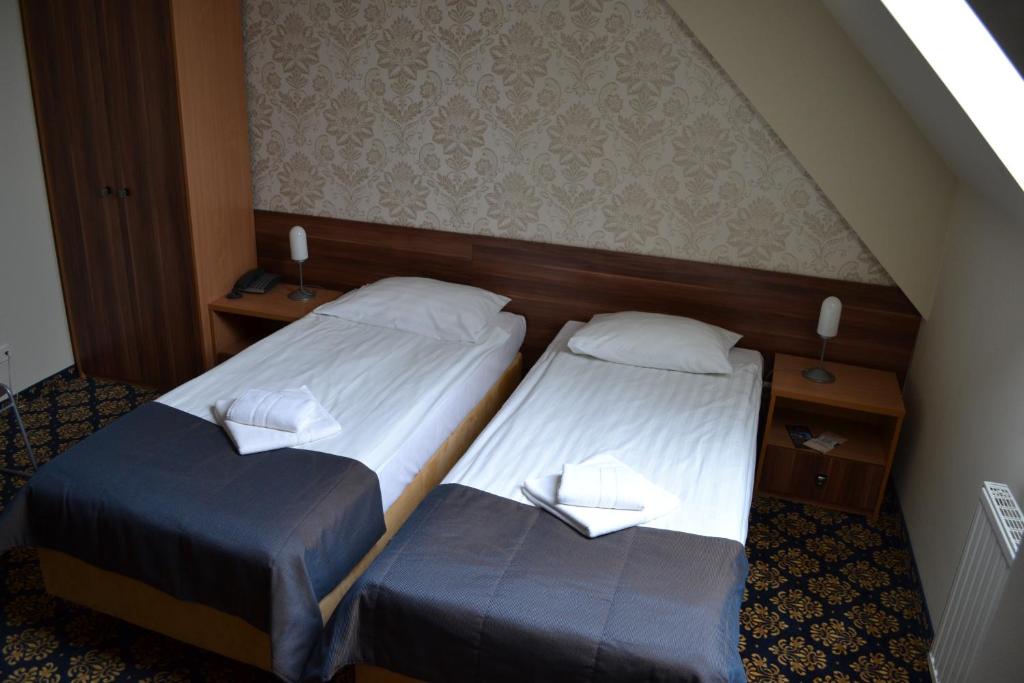Postel nebo postele na pokoji v ubytování Titanic
