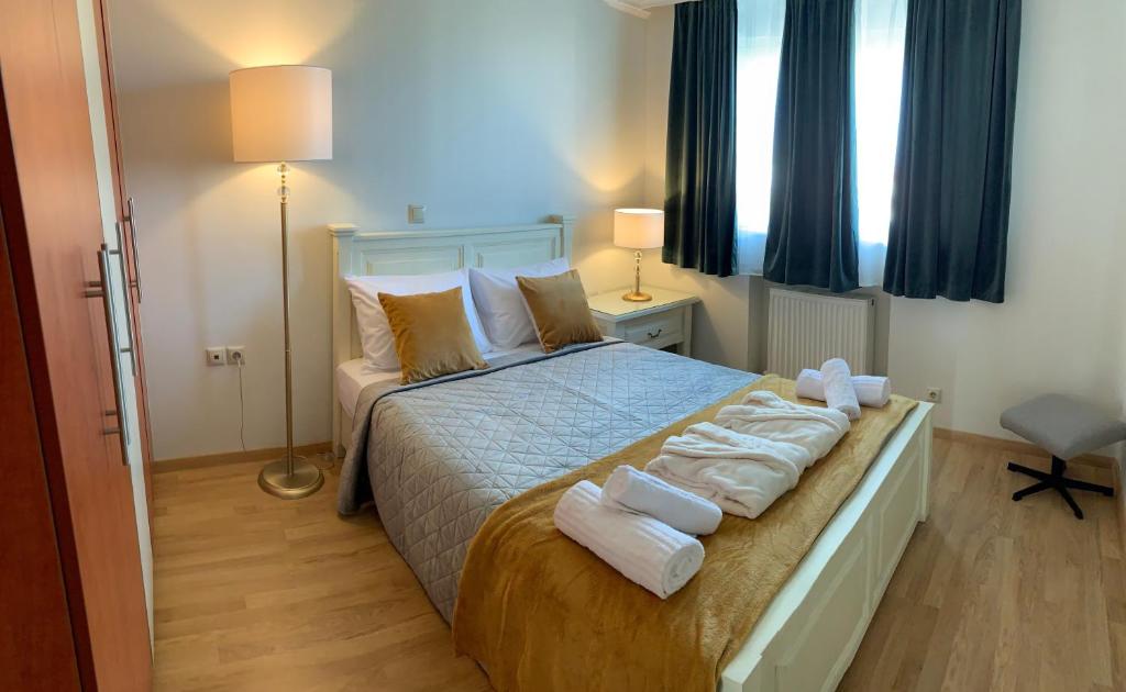 Postel nebo postele na pokoji v ubytování A&B Ialysos villas and apartments