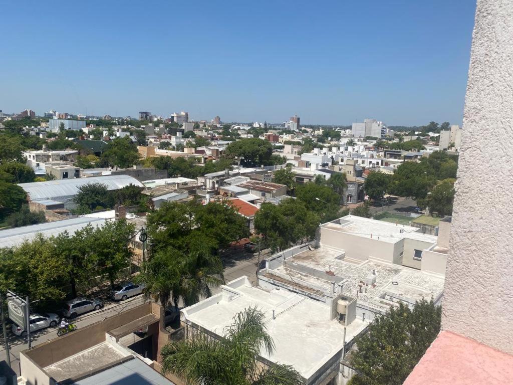 an aerial view of a city with buildings at Departamento amoblado in Villa María