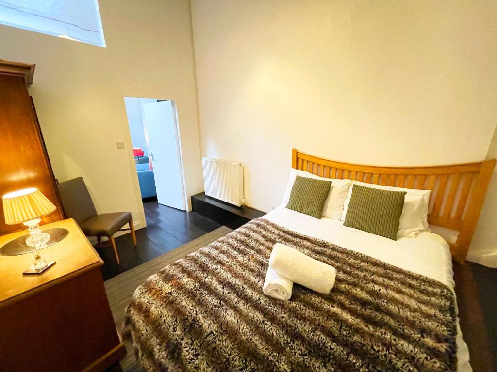 Postel nebo postele na pokoji v ubytování Catcune Grand Suite