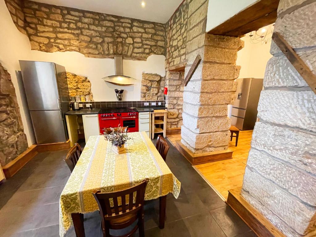 Kuchyň nebo kuchyňský kout v ubytování Catcune Grand Suite