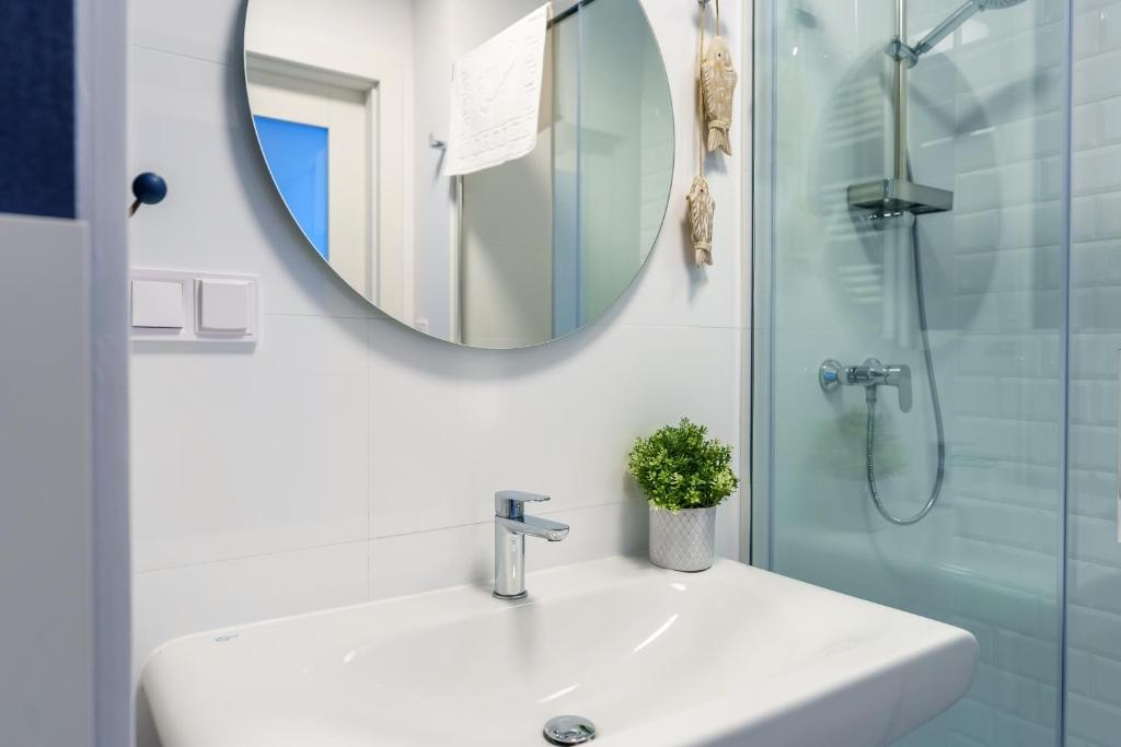 Kúpeľňa v ubytovaní Apartamenty Lighthouse Mrzeżyno
