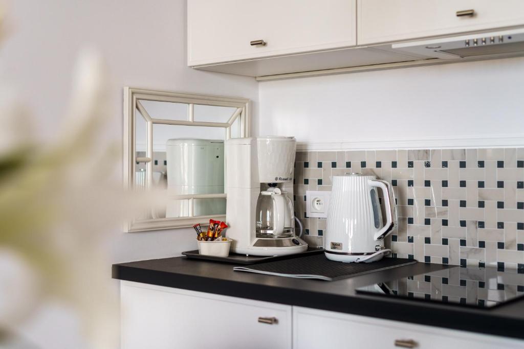 Kuchyňa alebo kuchynka v ubytovaní Apartamenty Lighthouse Mrzeżyno
