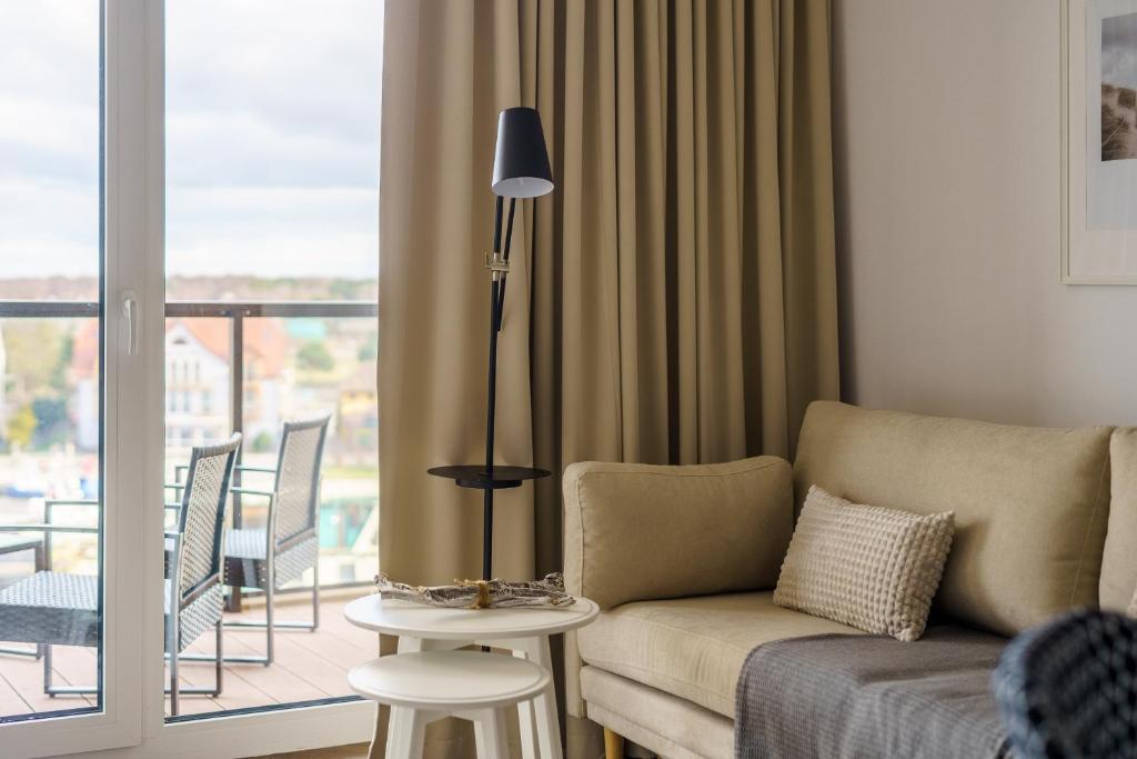 Posedenie v ubytovaní Apartamenty Lighthouse Mrzeżyno