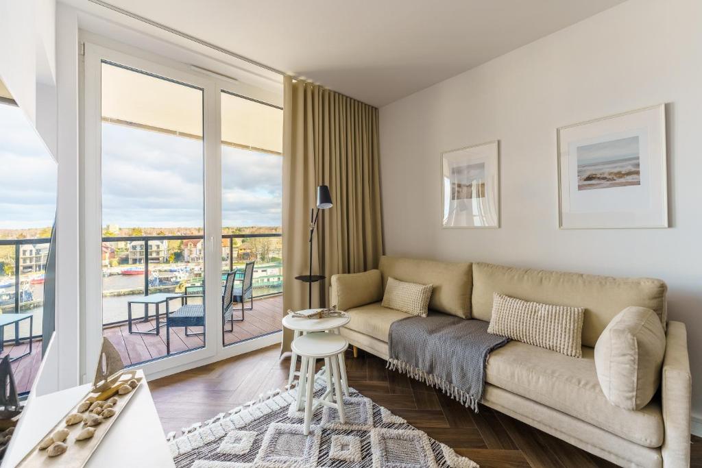 Posedenie v ubytovaní Apartamenty Lighthouse Mrzeżyno
