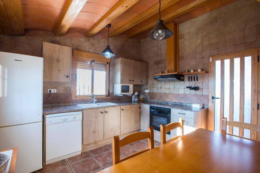 Kuchyň nebo kuchyňský kout v ubytování Villa Parets de Sucre