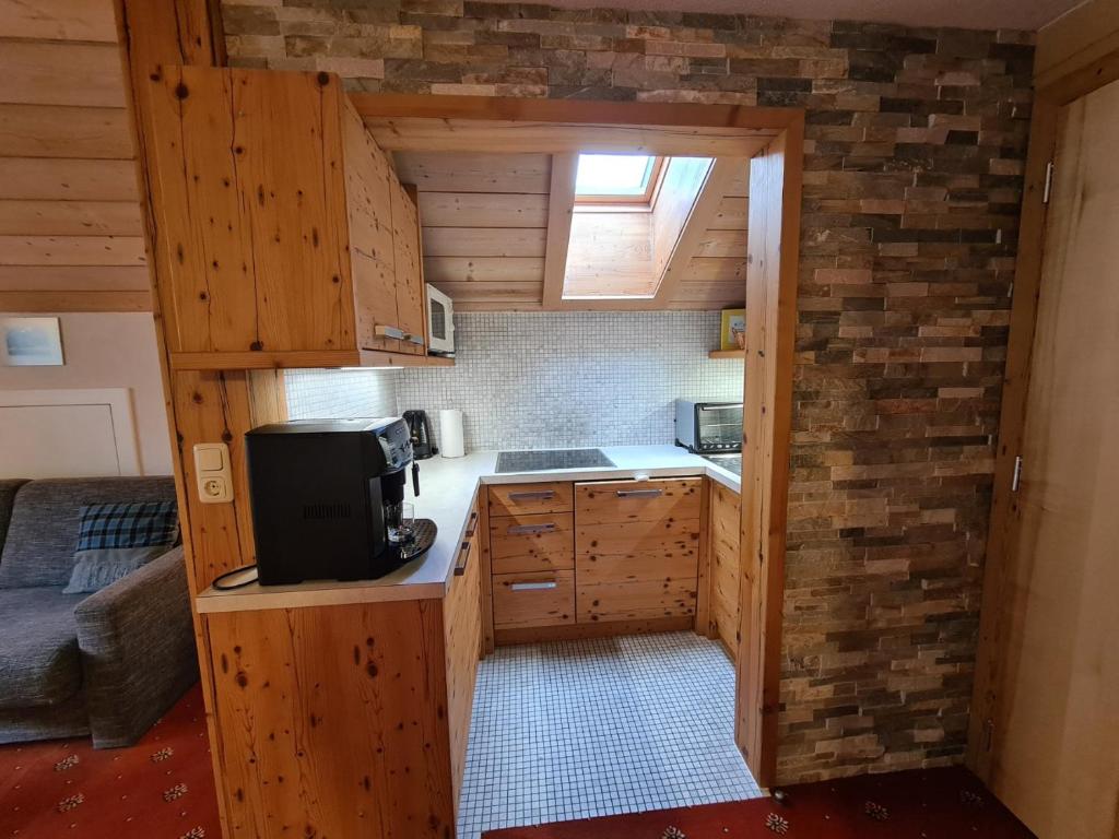 Kuchyň nebo kuchyňský kout v ubytování Appartements Luttinger