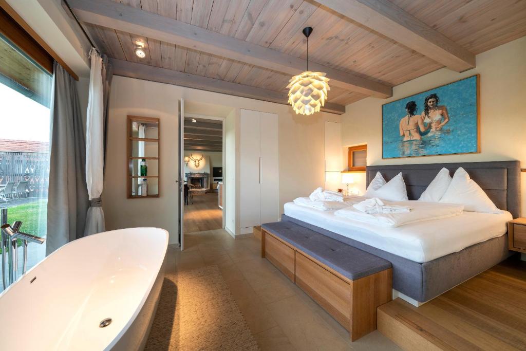A bed or beds in a room at Stadl Niglberg Südsteiermark