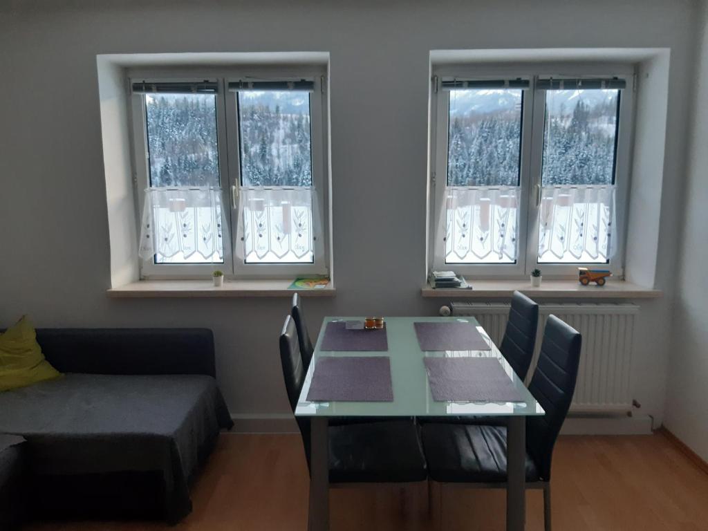 Posezení v ubytování Four Seasons Apartment Josef