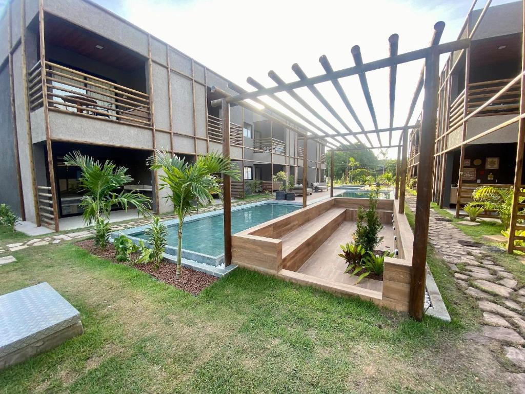 A piscina localizada em Villa Kamby Acomodações Rota dos Milagres ou nos arredores