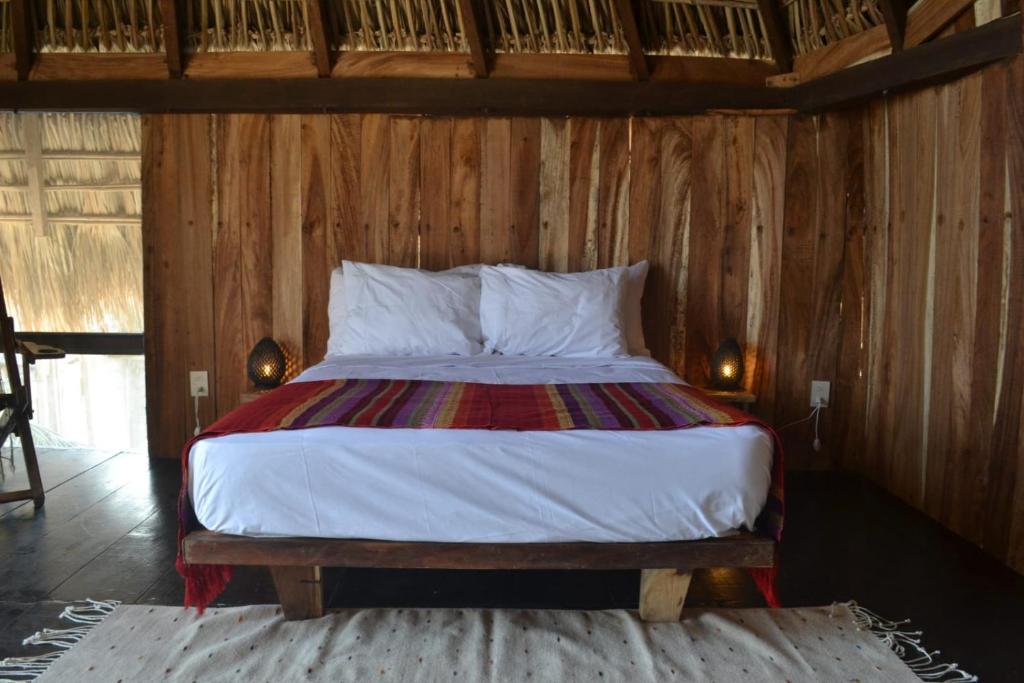 Postel nebo postele na pokoji v ubytování Casa playa del Amor