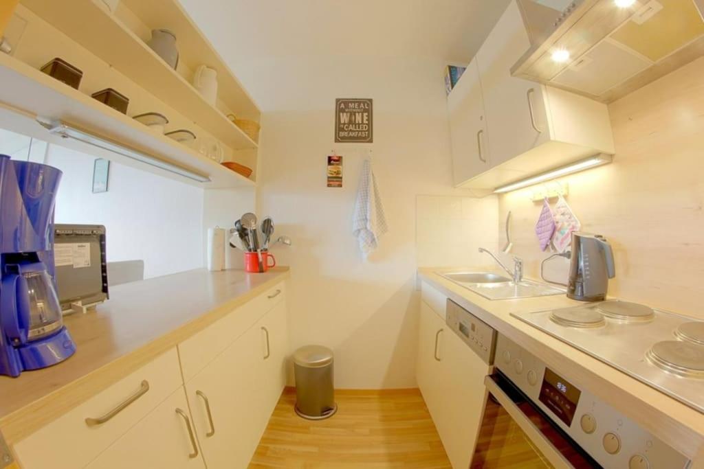 Kuchyň nebo kuchyňský kout v ubytování Apartment Brockenblick mit tollen Blick und Schwimmbad