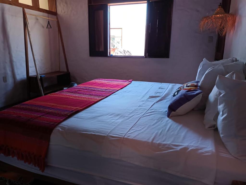 Postel nebo postele na pokoji v ubytování Casa playa del Amor