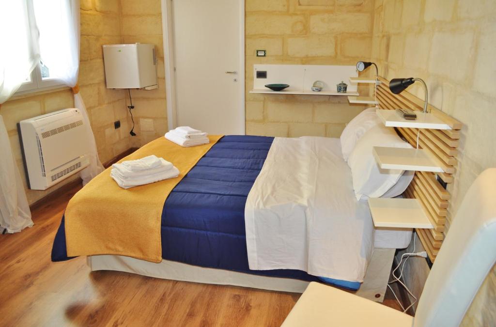 Postel nebo postele na pokoji v ubytování B&B Lecce Holidays