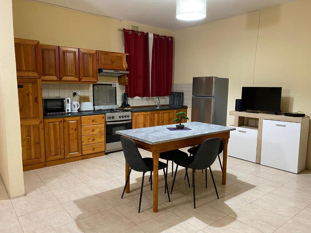 Kuchyň nebo kuchyňský kout v ubytování Gozo Belle Mare Apartments